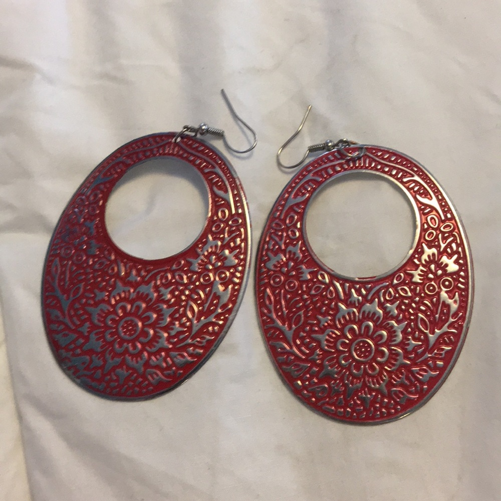 Red and silver earrings.